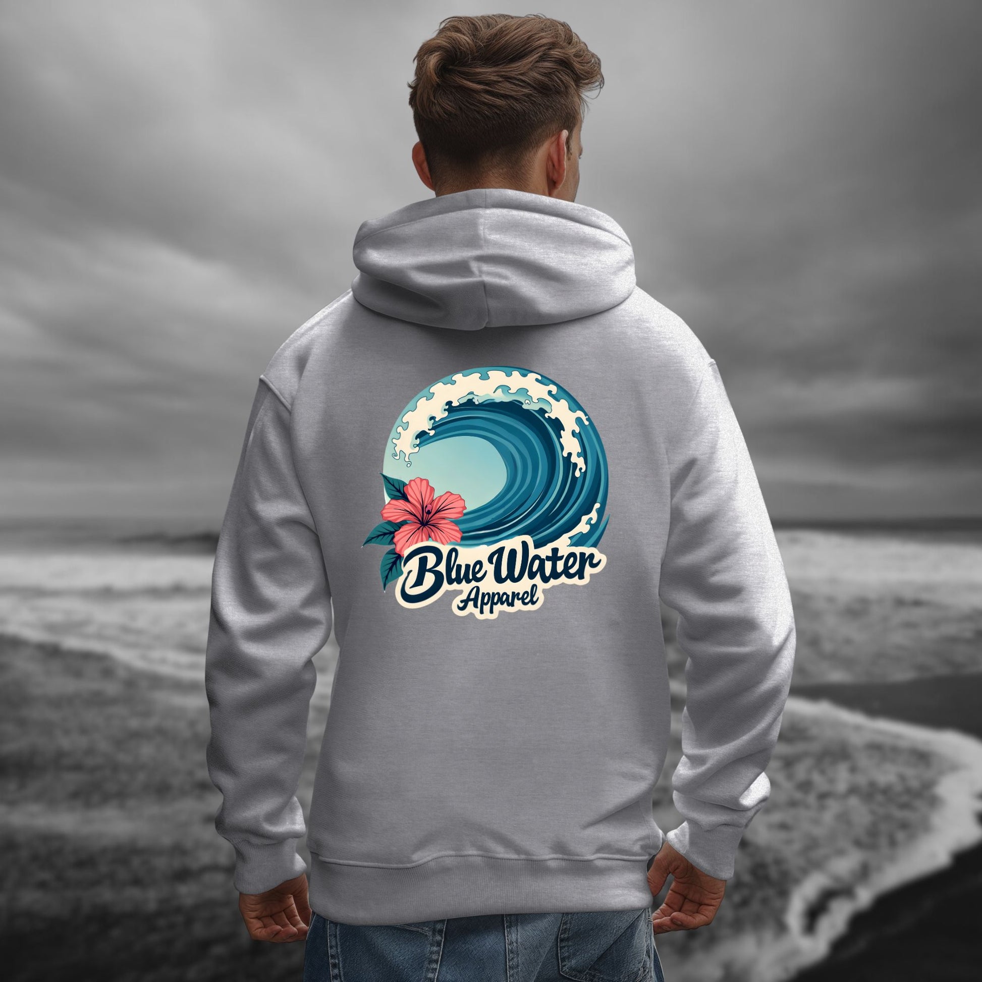 model on beach wearing sport grey hibiscus wave hoodie by blue water apparel