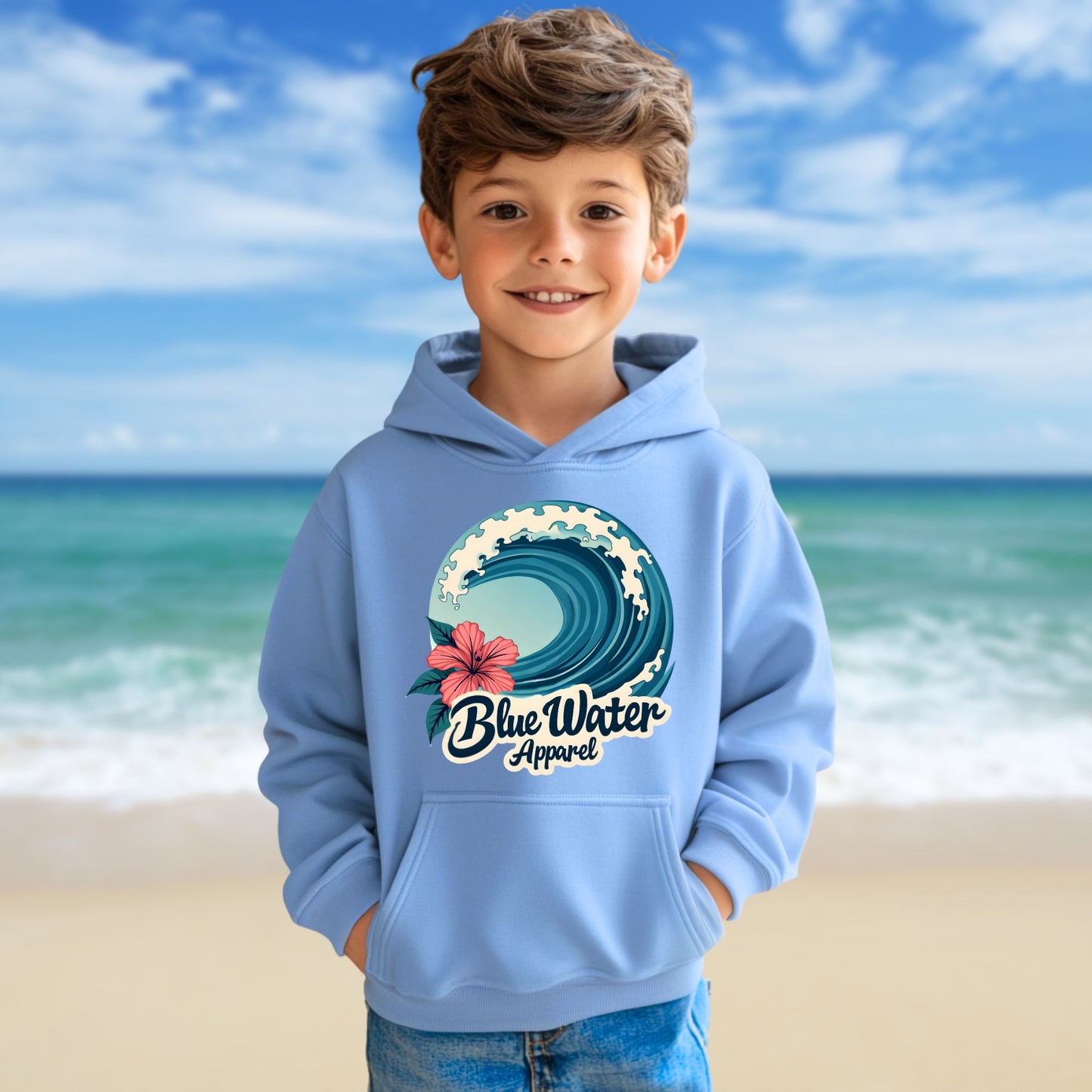 child model on beach wearing carolina blue hibiscus wave kids hoodie by blue water apparel
