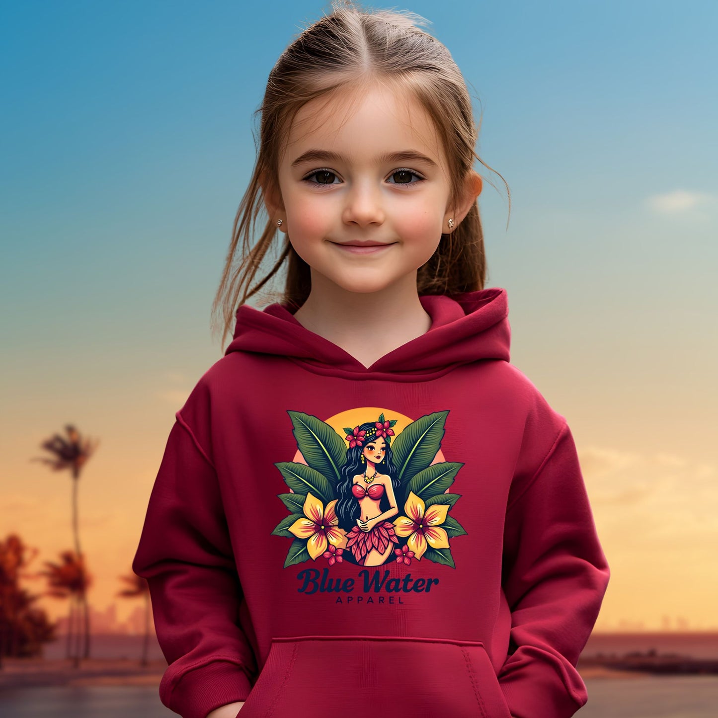child model on beach wearing cardinal red island girl kids hoodie by blue water apparel
