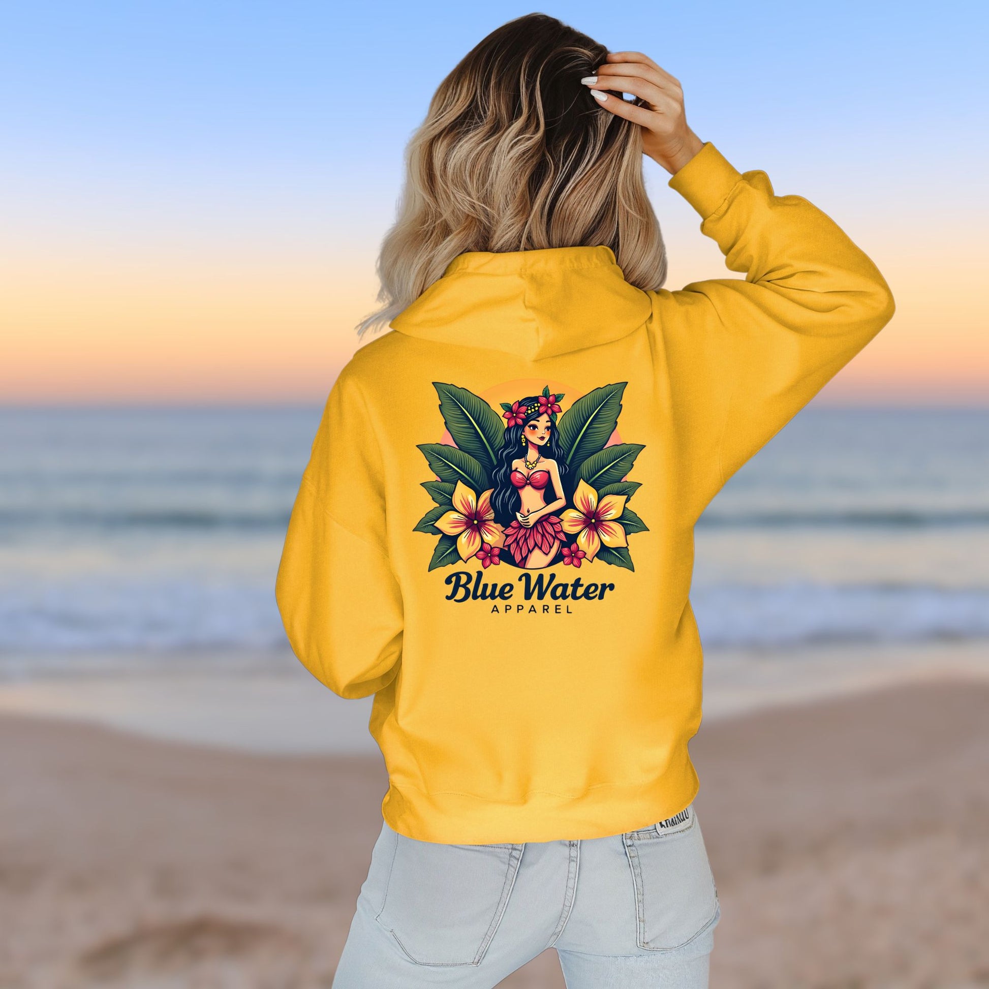female model on beach wearing gold island girl hoodie by blue water apparel