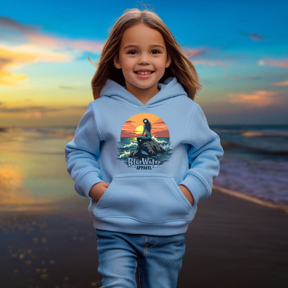 child model on beach wearing carolina blue mermaid sunset kids hoodie by blue water apparel