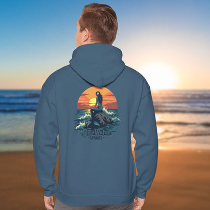 model on beach wearing indigo blue vintage mermaid hoodie by blue water apparel