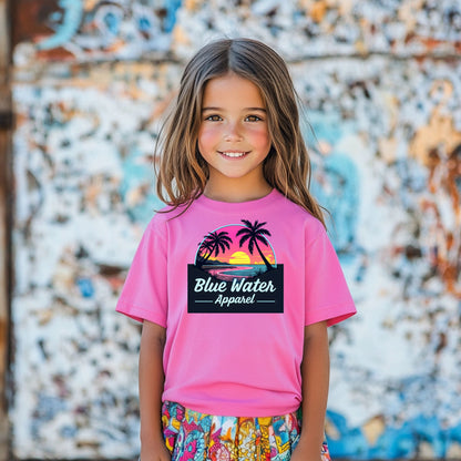 child model wearing azalea neon sunset kids tee against textured wall by blue water apparel