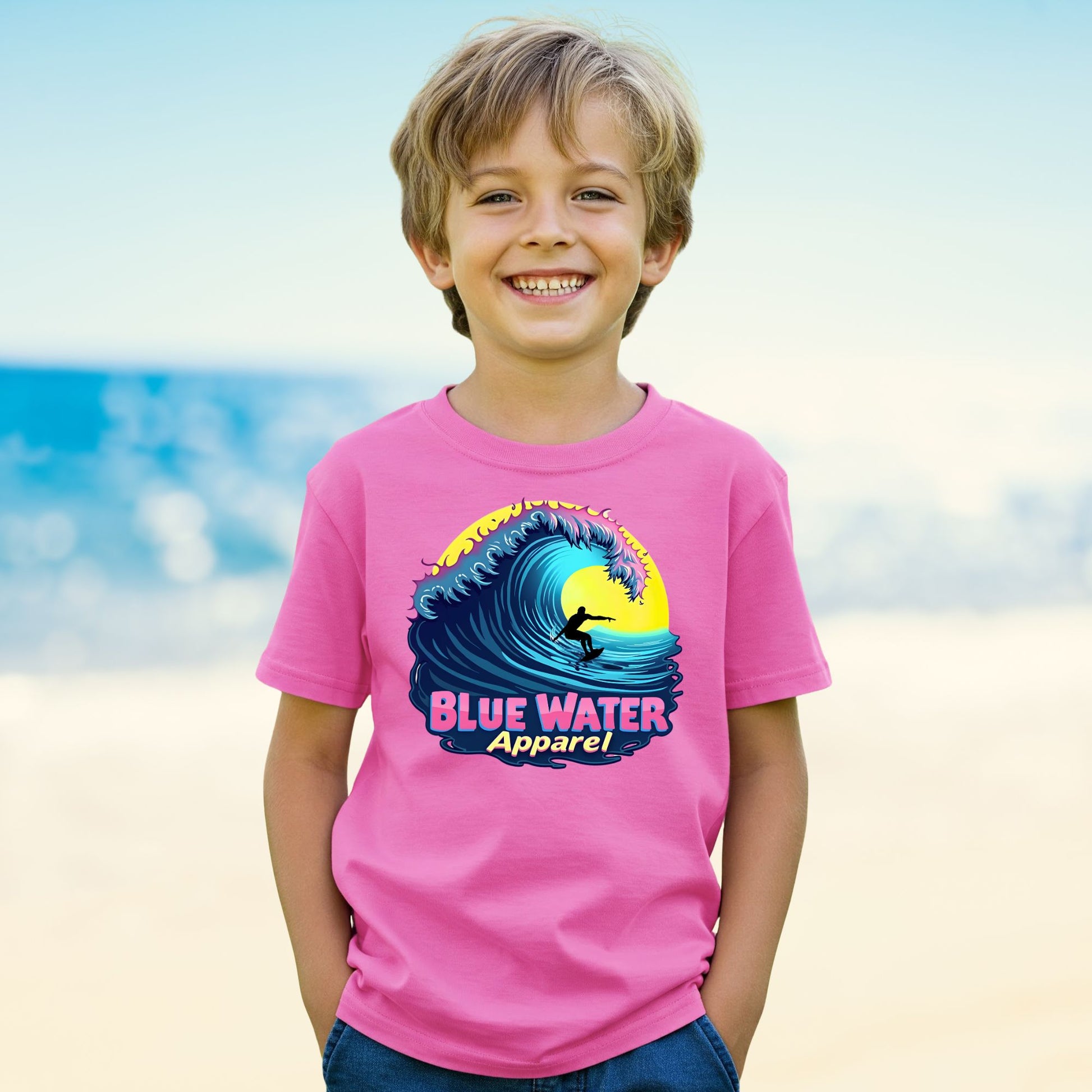 kid on beach wearing azalea neon surfer tee by blue water apparel