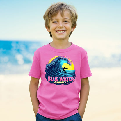 kid on beach wearing azalea neon surfer tee by blue water apparel