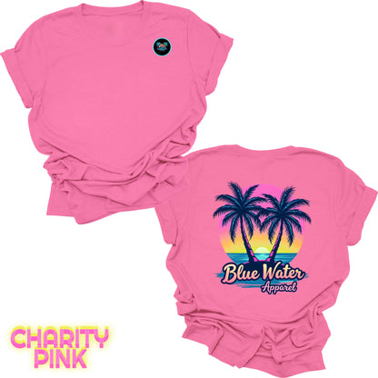 flat lay back graphic charity pink neon tropics tee by blue water apparel