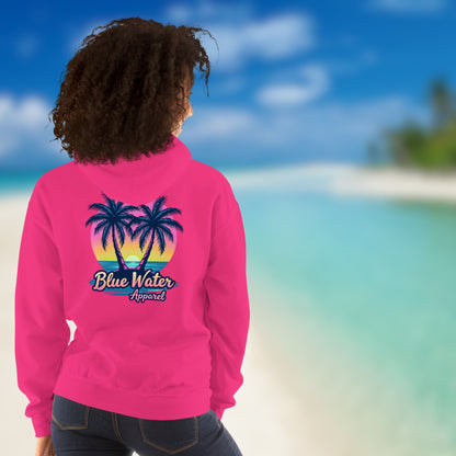 female model on beach on wearing heliconia neon tropics hoodie by blue water apparel