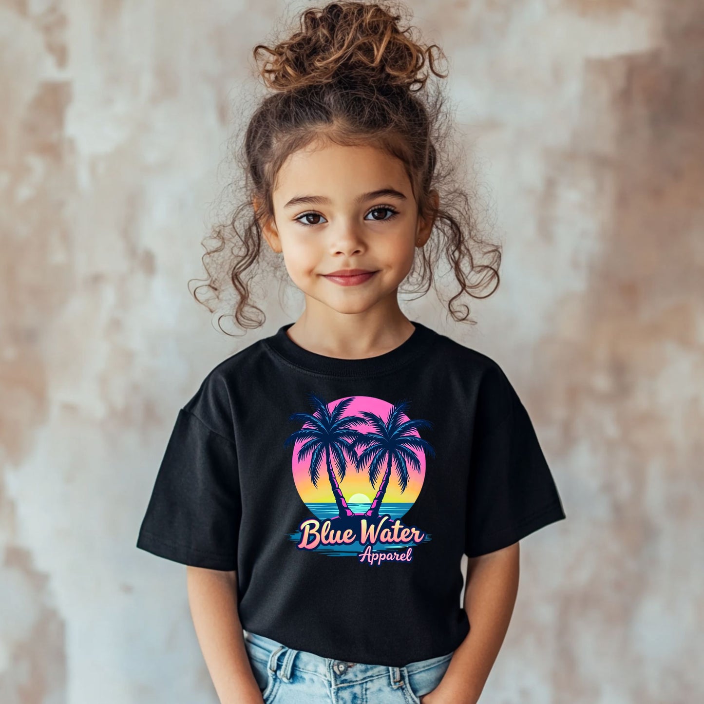 child model wearing black neon tropics tee by blue water apparel