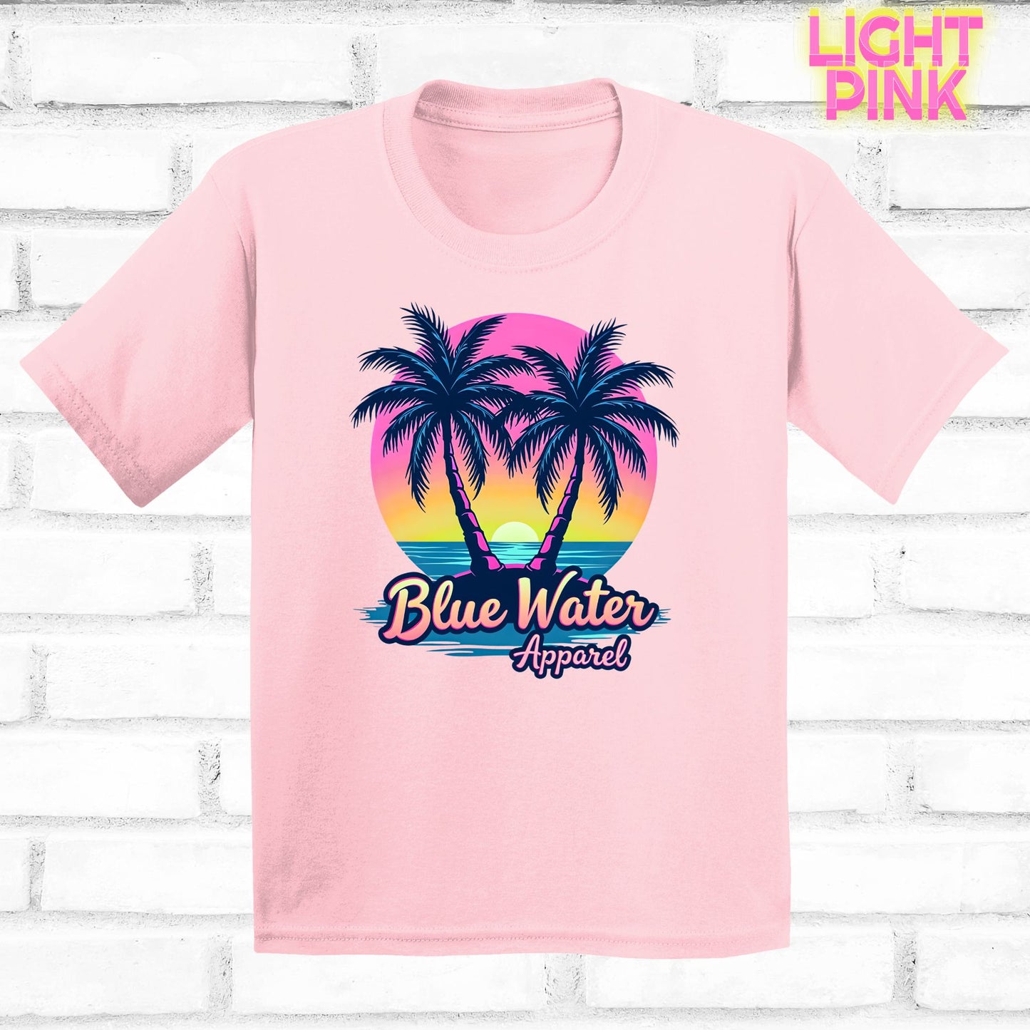 flat lay kids pink neon tropics tee by blue water apparel