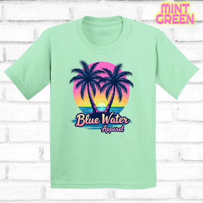 flat lay kids mint green neon tropics tee by blue water apparel
