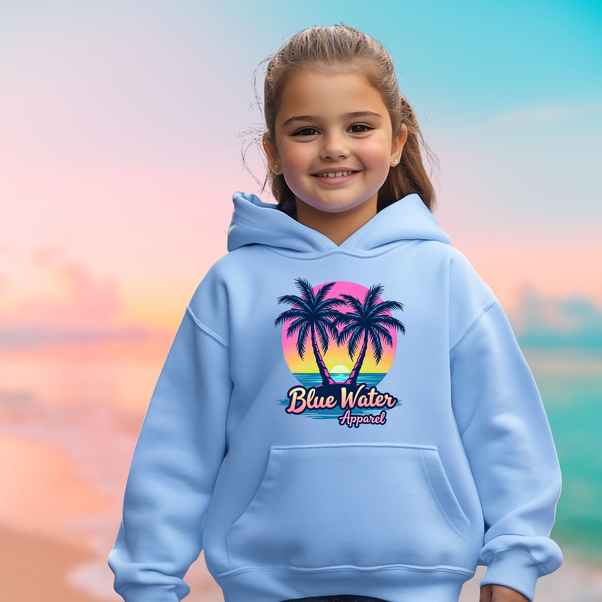 child model wearing carolina blue neon tropics kids hoodie by blue water apparel