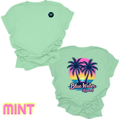 flat lay back graphic mint neon tropics tee by blue water apparel