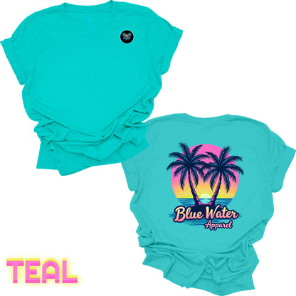 flat lay back graphic teal neon tropics tee by blue water apparel
