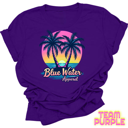 flat lay front graphic team purple neon tropics tee by blue water apparel