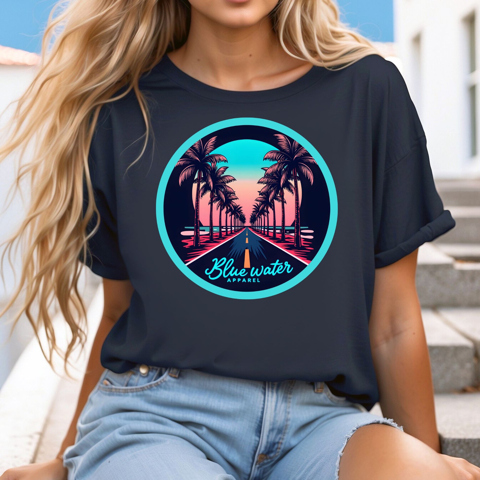 model on stairs wearing black palm tree road tee by blue water apparel