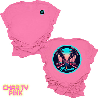 flat lay back graphic charity pink palm tree road tee by blue water apparel
