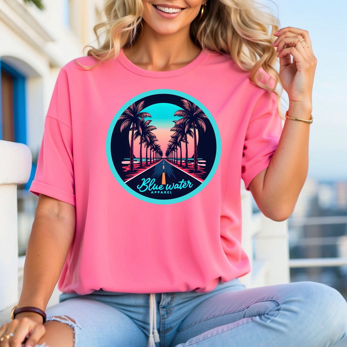model wearing charity  pink palm tree road tee by blue water apparel
