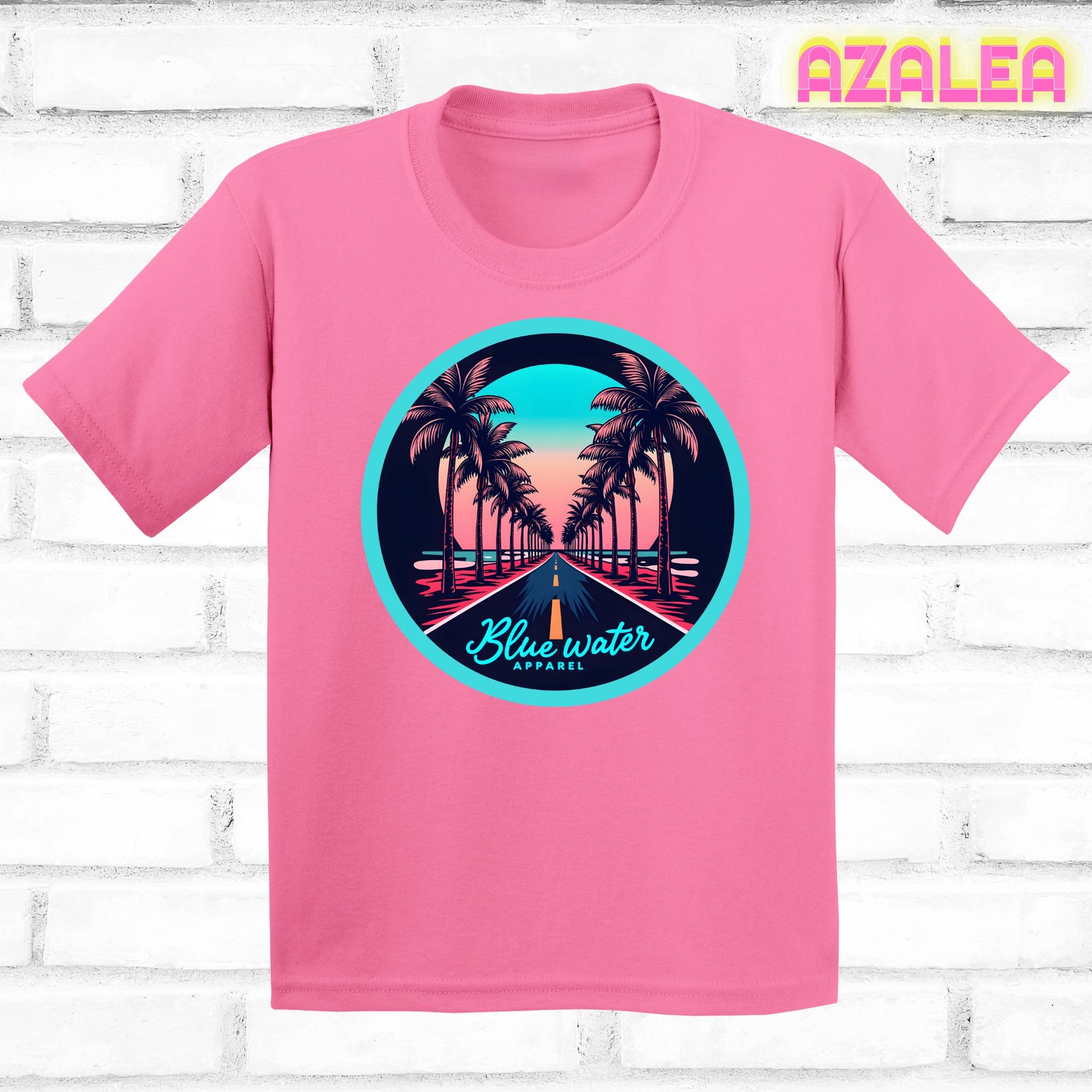 flat lay of azalea palm tree road tee by blue water apparel