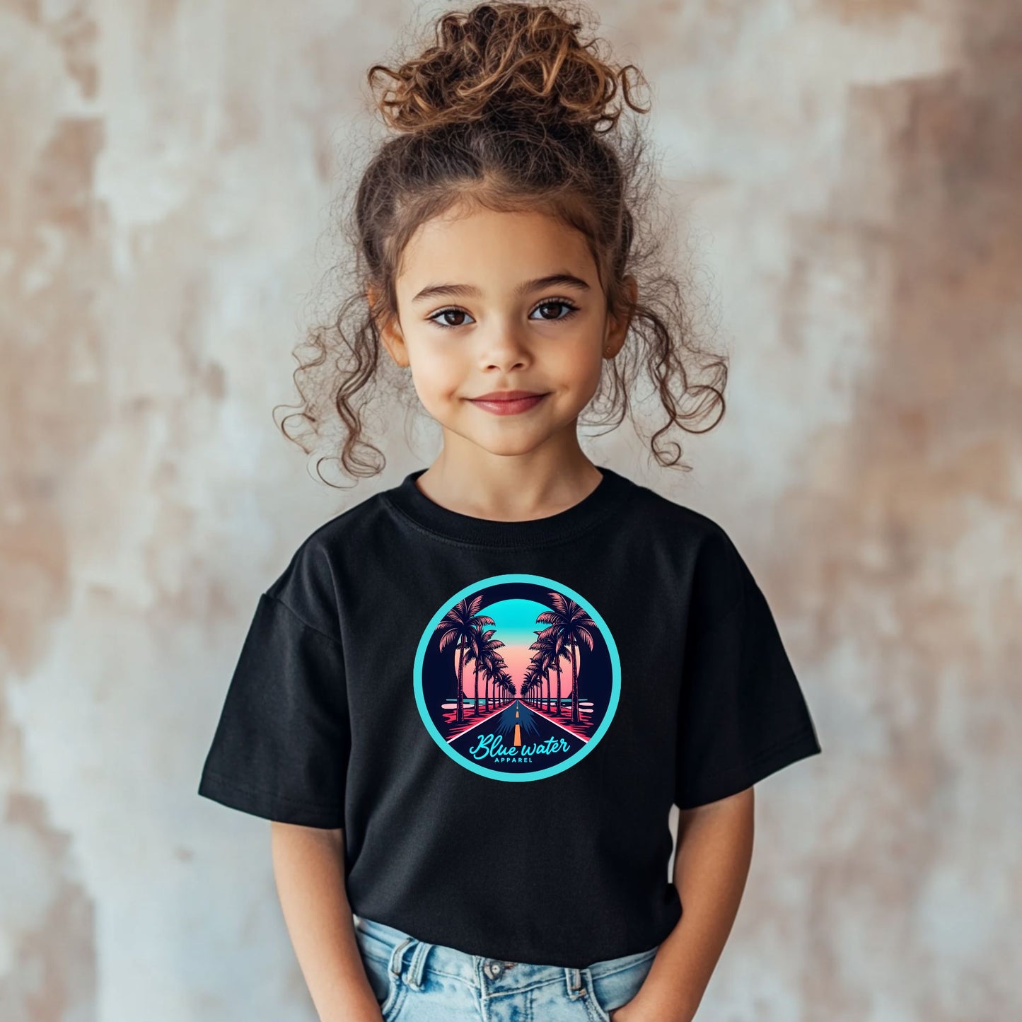 female child model wearing black palm tree road tee by blue water apparel