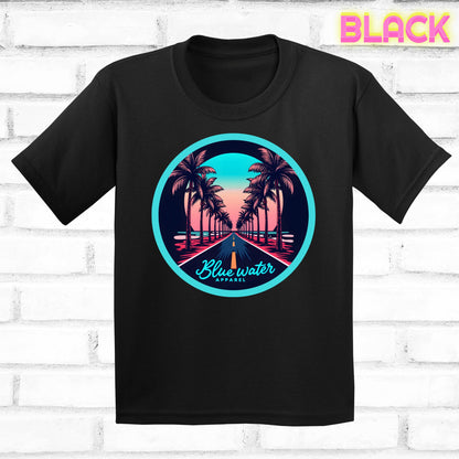 flat lay of black palm tree road tee by blue water apparel