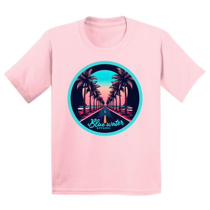 flat lay light pink palm tree road kids tee by blue water apparel