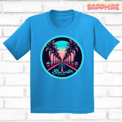 flat lay of sapphire palm tree road tee by blue water apparel
