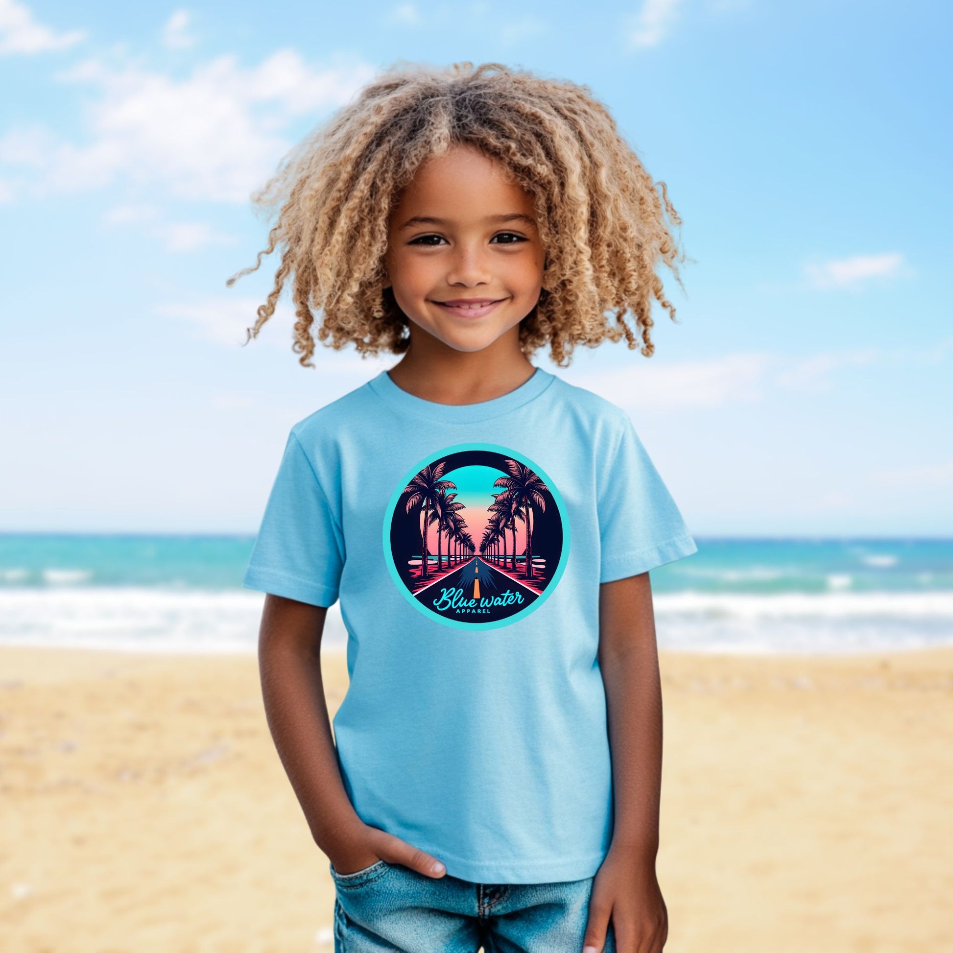 model on beach wearing sky palm tree road tee by blue water apparel