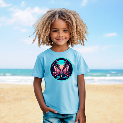 model on beach wearing sky palm tree road tee by blue water apparel