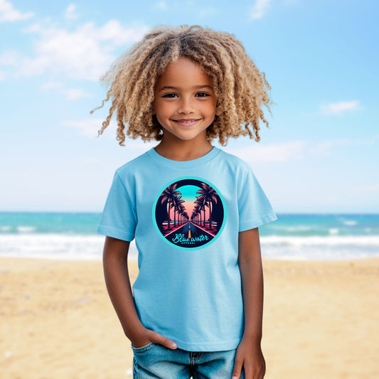 model on beach wearing sky palm tree road tee by blue water apparel