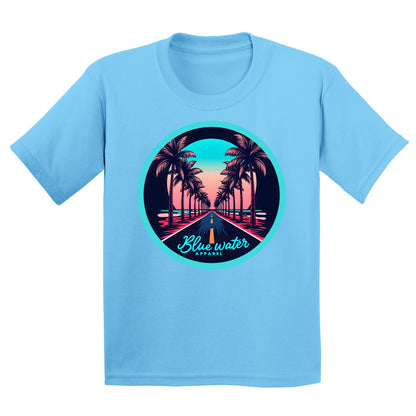 flat lay sky palm tree road kids tee by blue water apparel