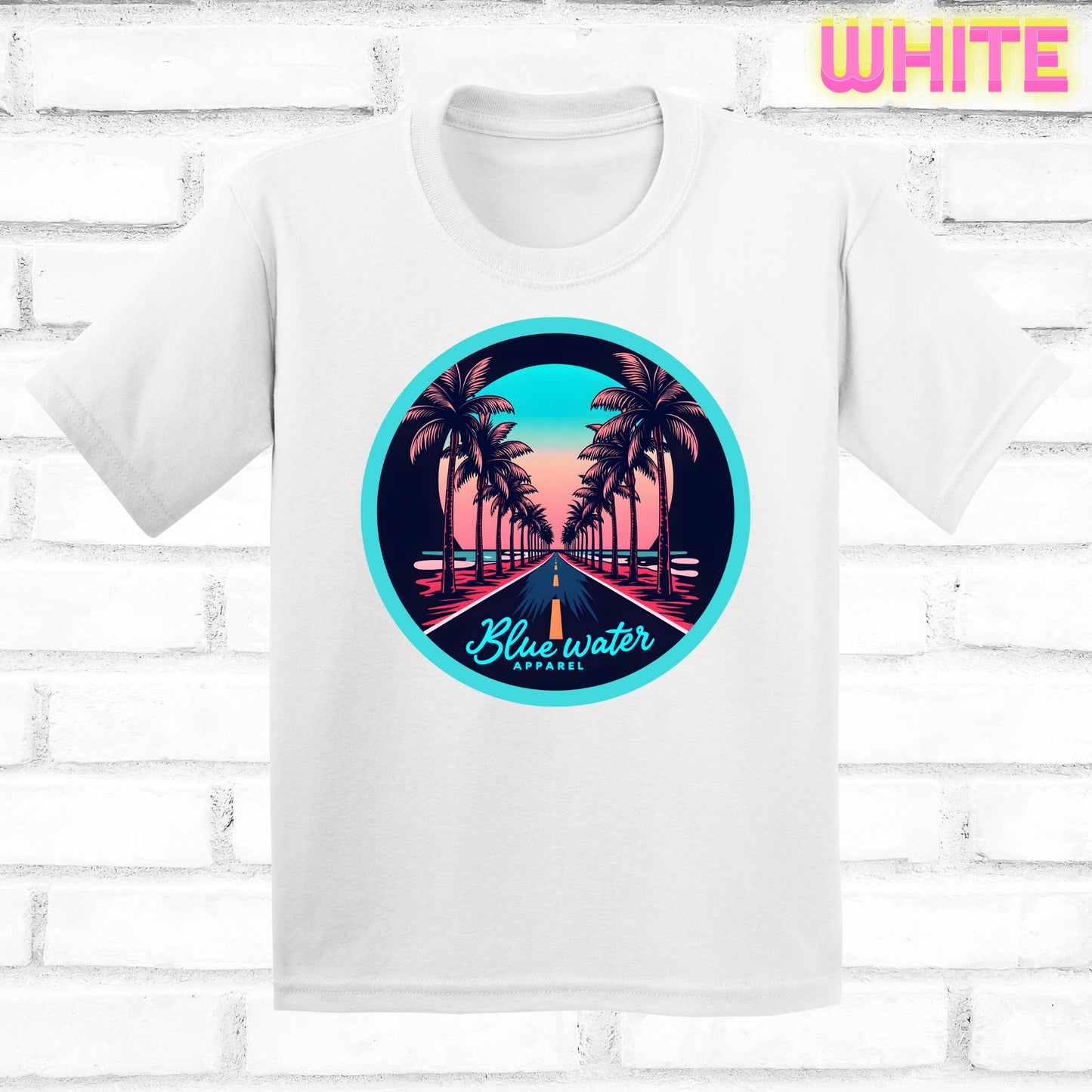 flat lay of white palm tree road tee by blue water apparel