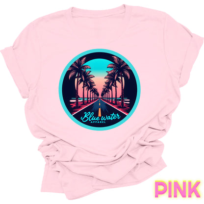 flat lay front graphic pink palm tree road tee by blue water apparel