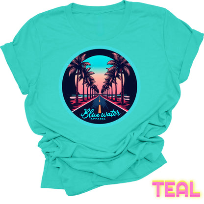 flat lay front graphic teal palm tree road tee by blue water apparel
