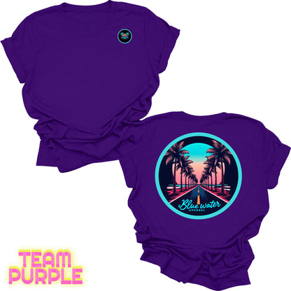 flat lay back graphic team purple palm tree road tee by blue water apparel