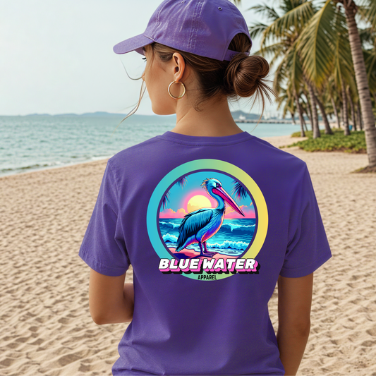 model on beach wearing team purple retro pelican tee by blue water apparel
