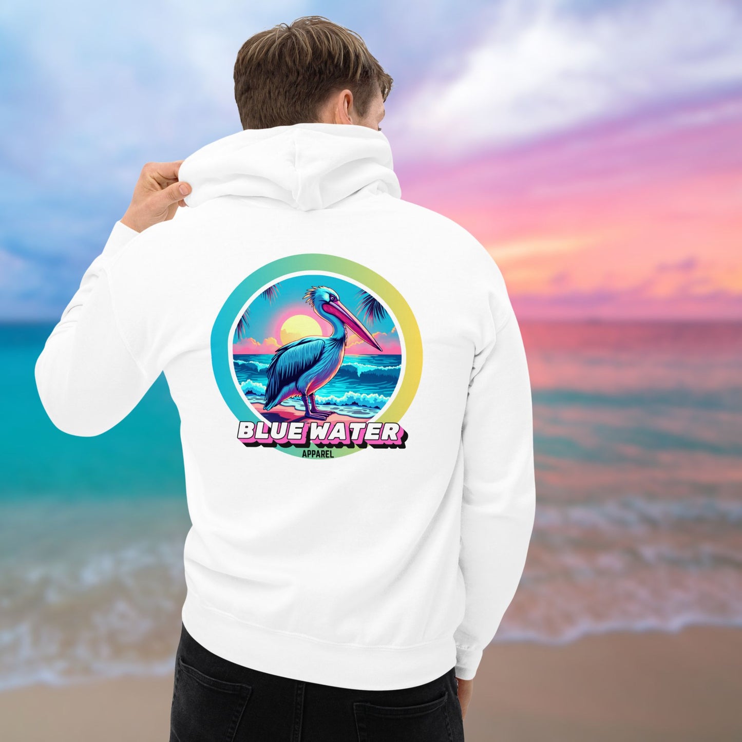 male model on beach wearing white retro pelican hoodie by blue water apparel