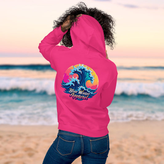 woman model on beach wearing heliconia retro wave hoodie by blue water apparel