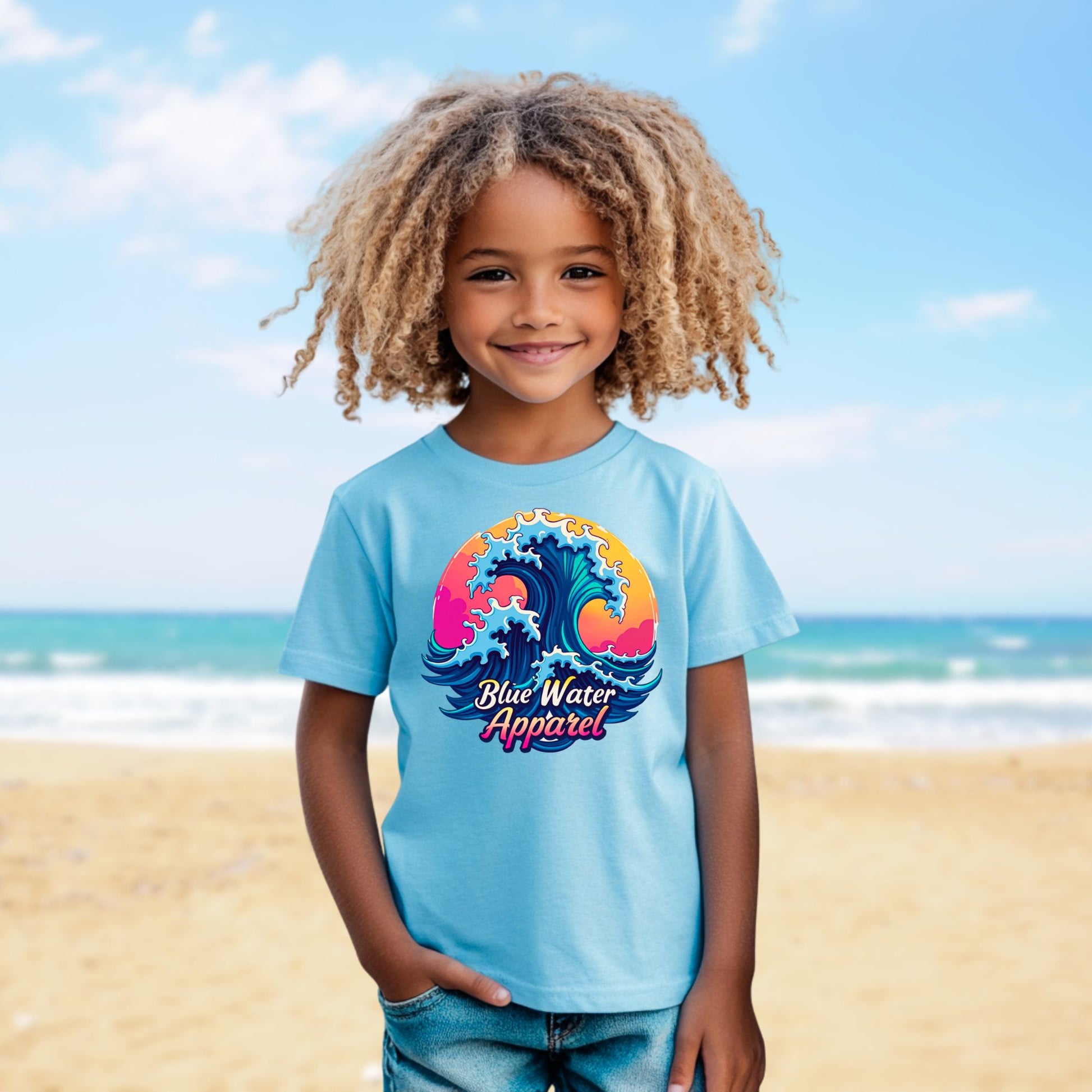 child model on beach wearing sky retro wave tee by blue water apparel