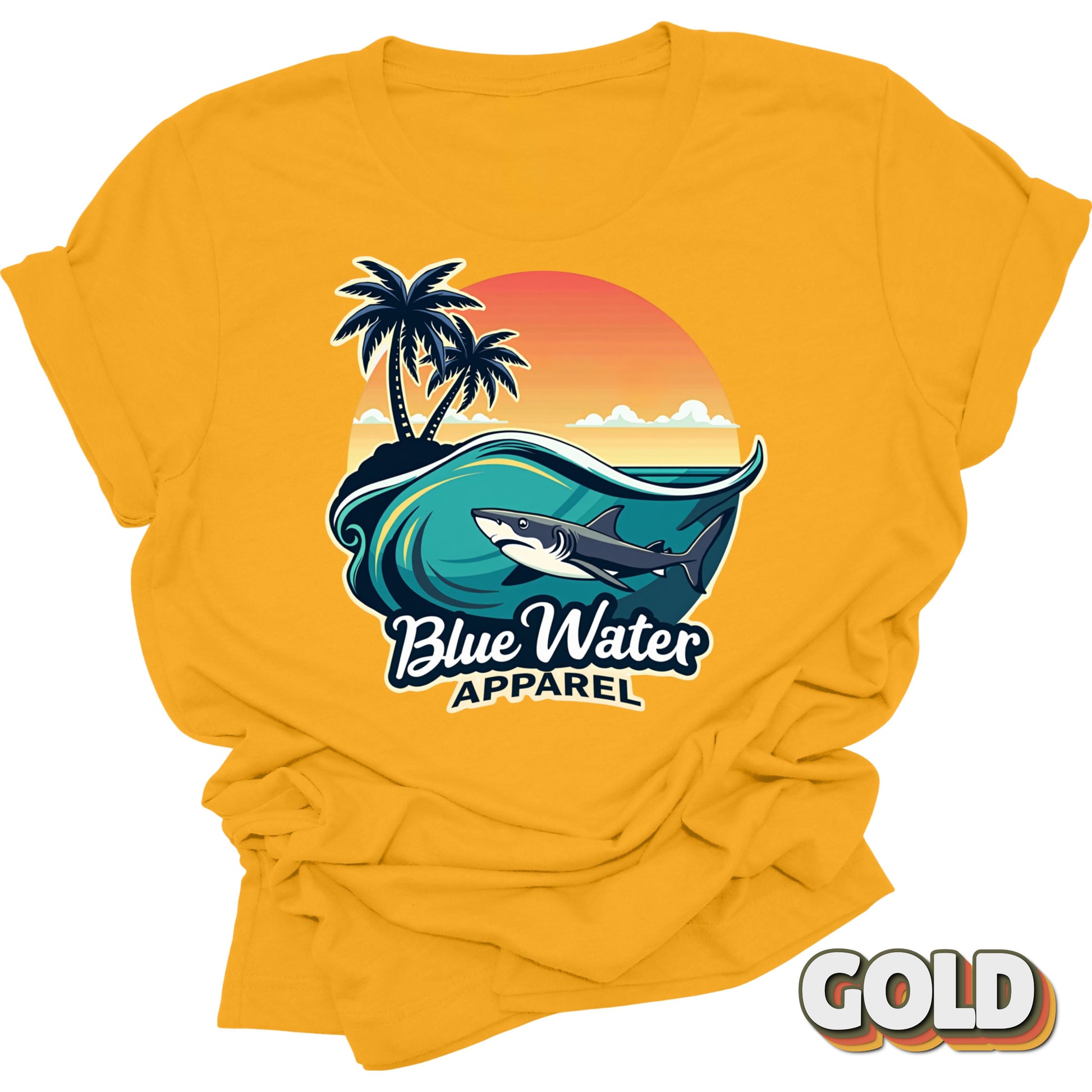 flat lay front graphic shark wave gold tee by blue water apparel