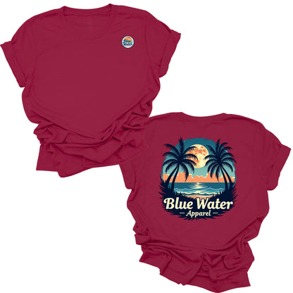 front and back flat lay of cardinal tropical moon tee by blue water apparel