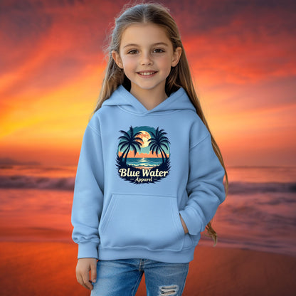 child model on beach wearing carolina blue tropical moon kids hoodie by blue water apparel