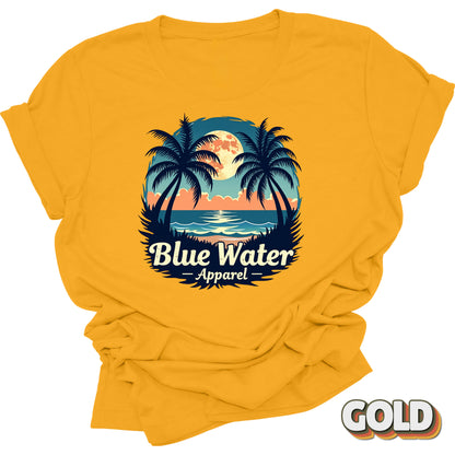 flat lay front graphic of gold tropical moon tee by blue water apparel