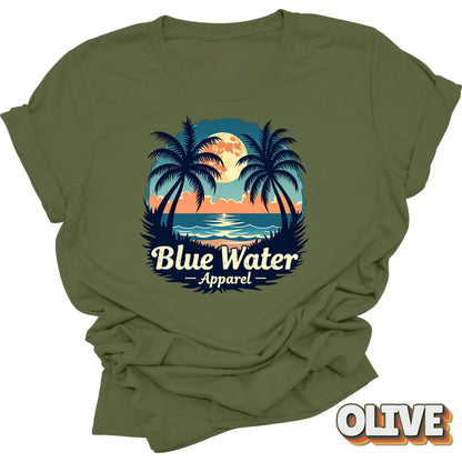 flat lay front graphic of olive tropical moon tee by blue water apparel