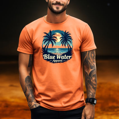 tattooed model wearing an orange tropical moon tee by blue water apparel
