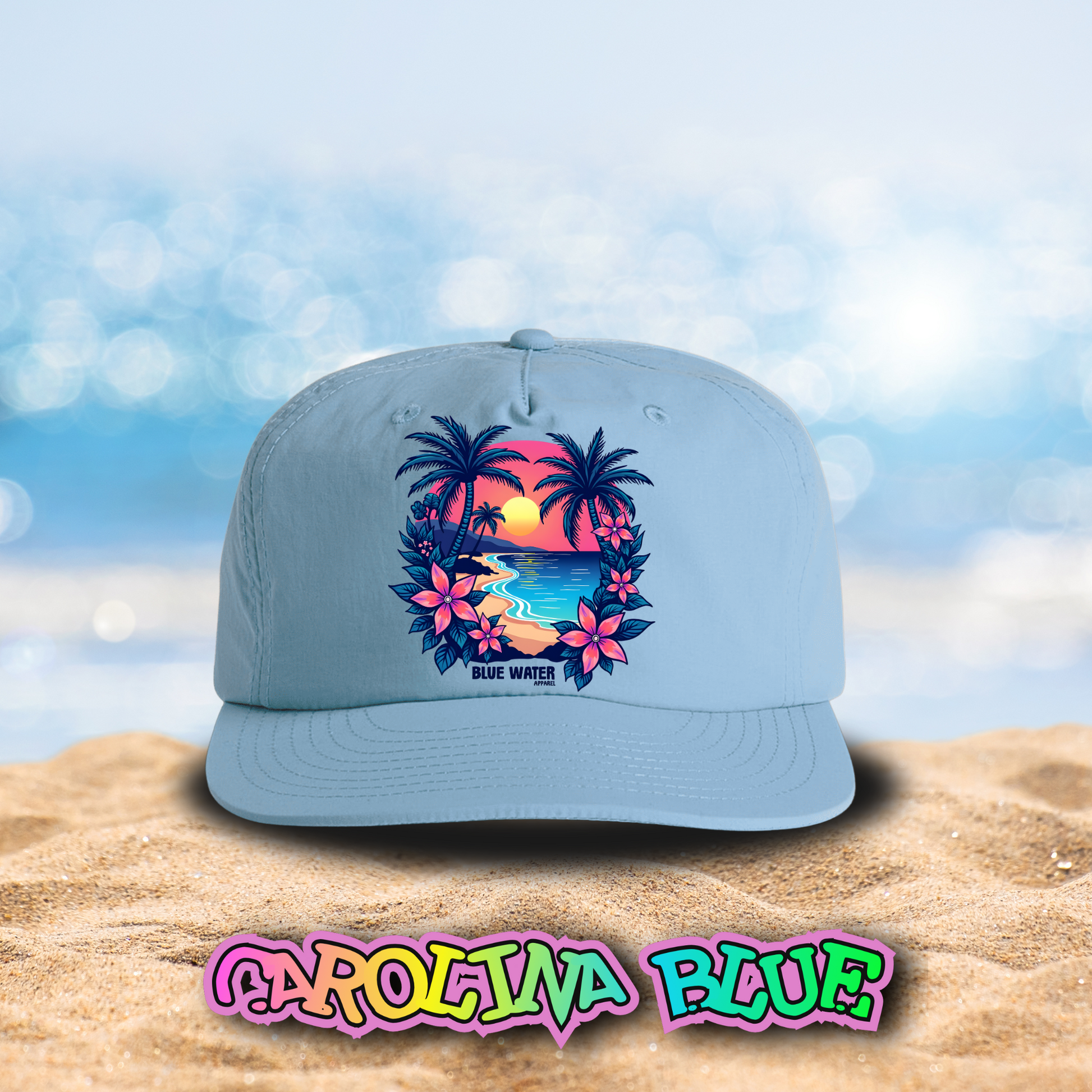 flat lay carolina blue tropical sunset surf cap on beach by blue water apparel