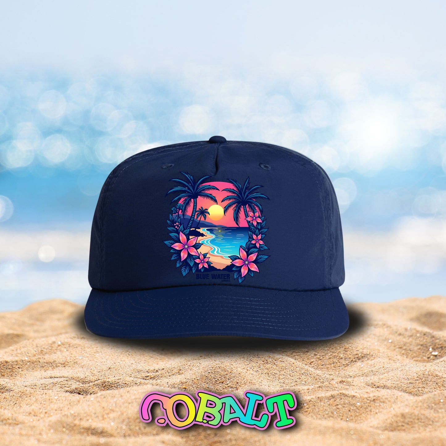 cobalt tropical sunset surf cap on beach by blue water apparel
