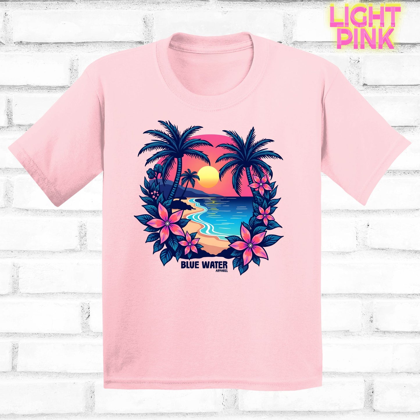 flat lay light pink tropical sunset tee by blue water apparel