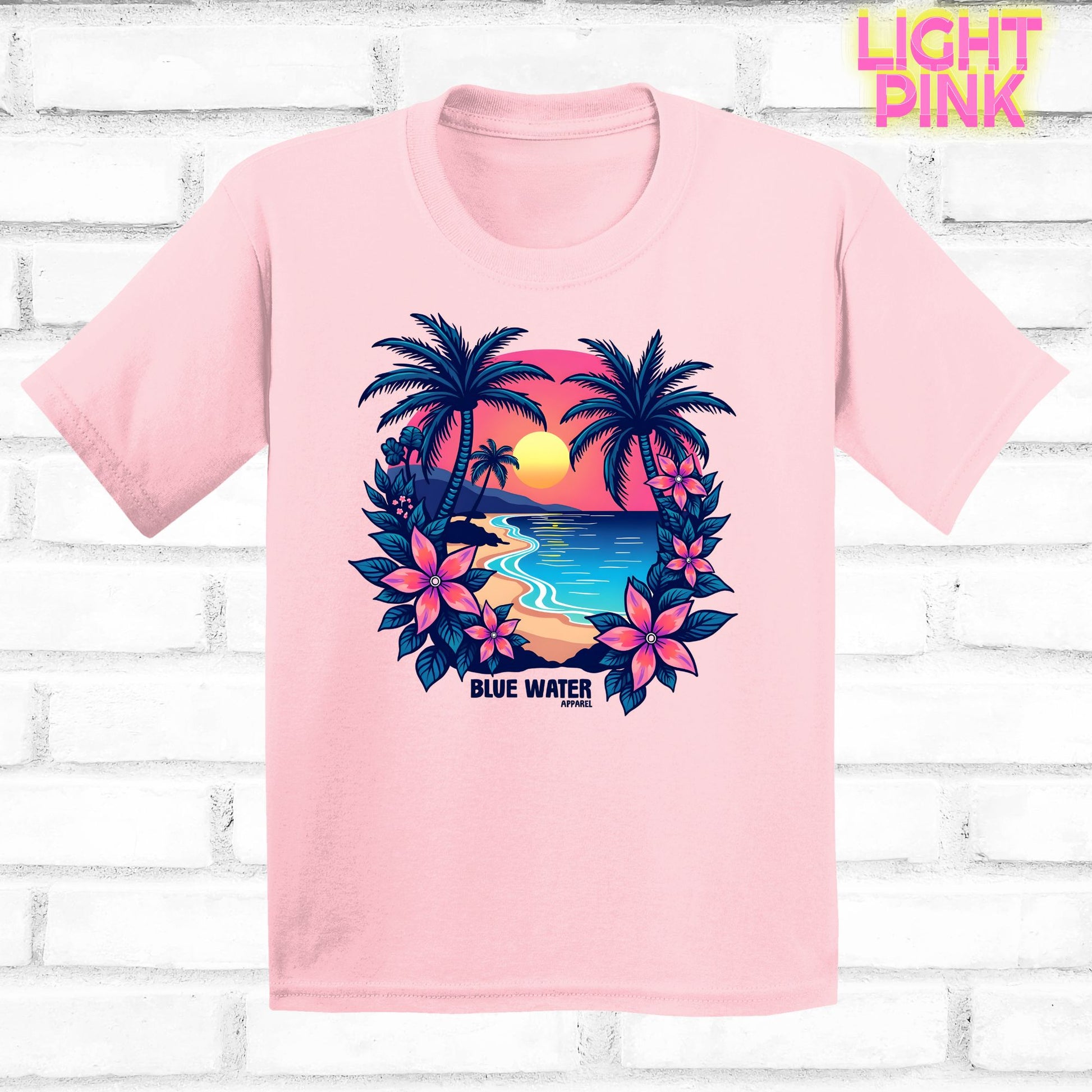 flat lay light pink tropical sunset tee by blue water apparel