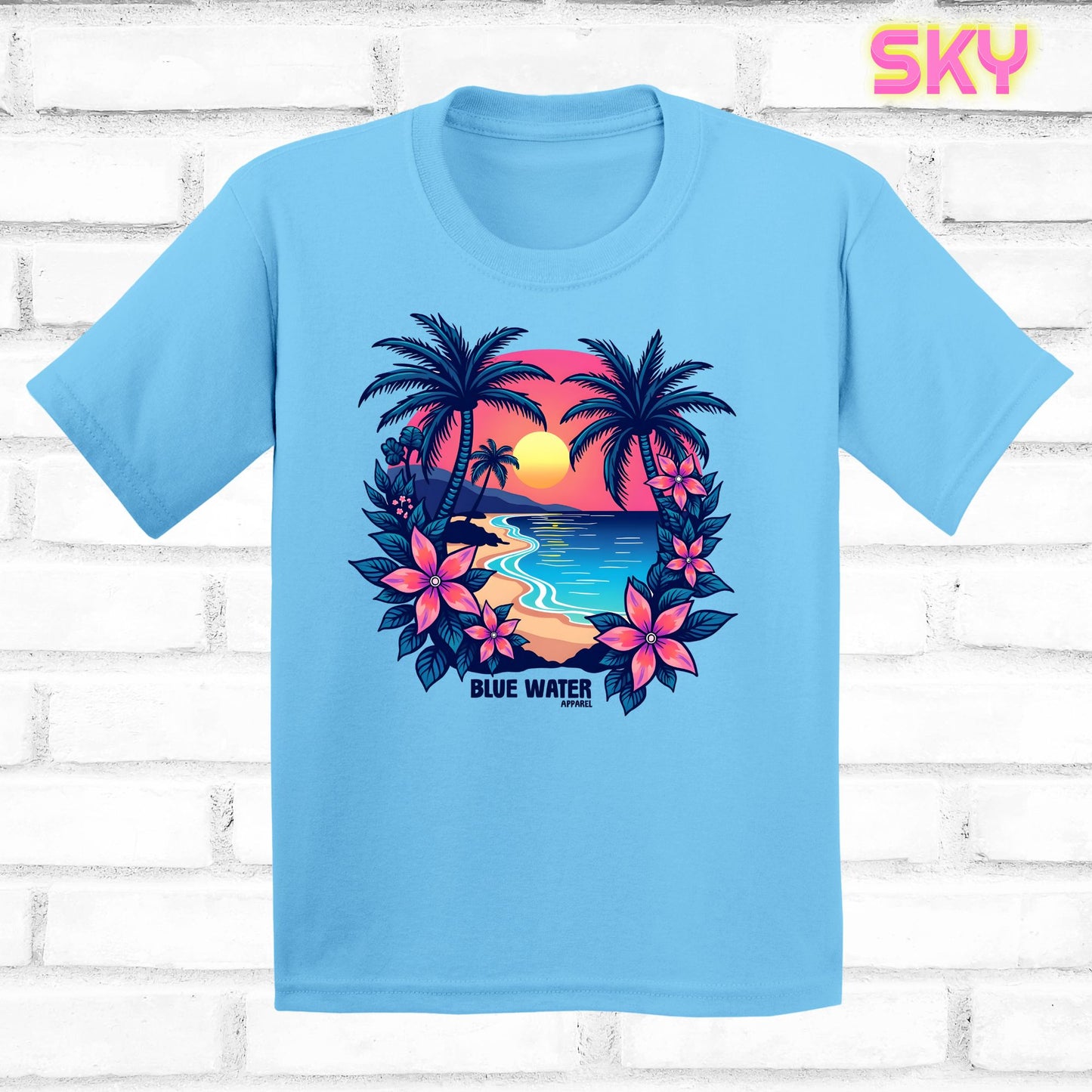 flat lay sky tropical sunset tee by blue water apparel
