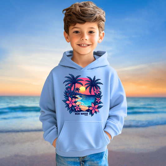 male model on beach wearing carolina blue tropical sunset kids hoodie by blue water apparel